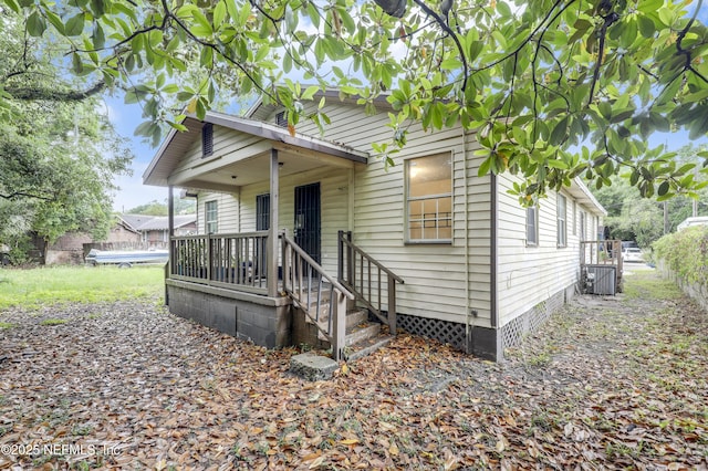 330 W 26th St, Jacksonville, FL 32206 - shotgun-style home featuring central air condition unit and crawl space