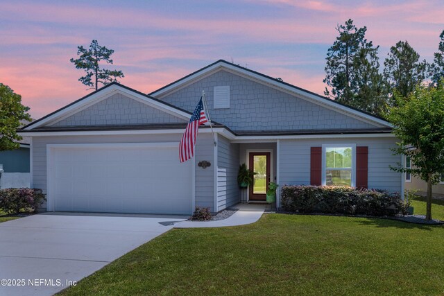 4328 Packer Meadow Way, Middleburg, FL 32068 - ranch-style home featuring an attached garage, driveway, and a lawn