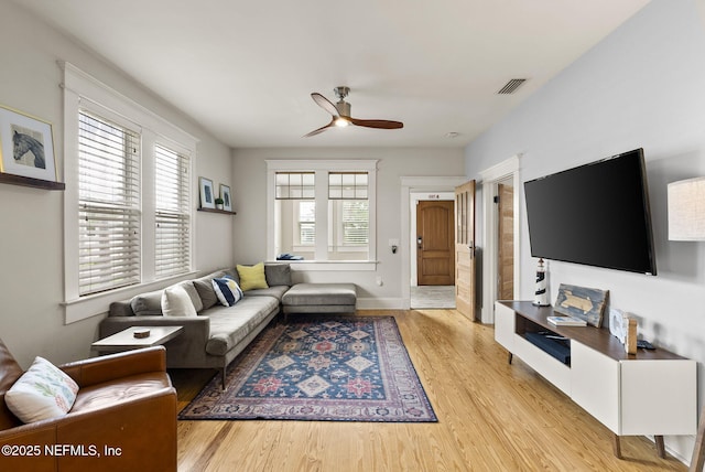 206 Cabeza St, Saint Augustine, FL 32080 - living room with light wood finished floors, ceiling fan, and baseboards