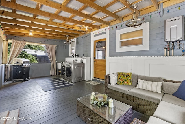 206 Cabeza St, Saint Augustine, FL 32080 - wooden deck featuring washing machine and clothes dryer, water heater, outdoor lounge area, and grilling area