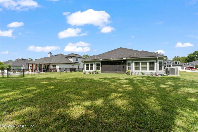 rear view of house with a sunroom