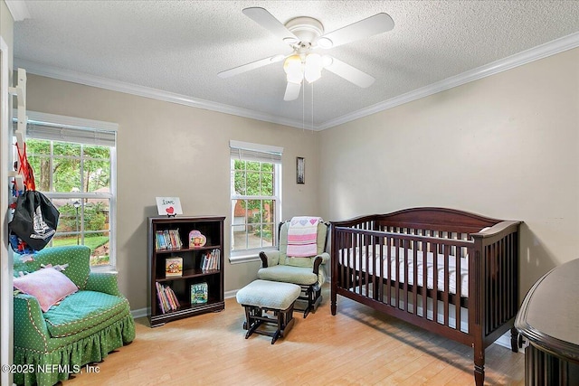 11921 Loretto Square Dr S, Jacksonville, FL 32223 - bedroom featuring wood finished floors, a textured ceiling, crown molding, and ceiling fan