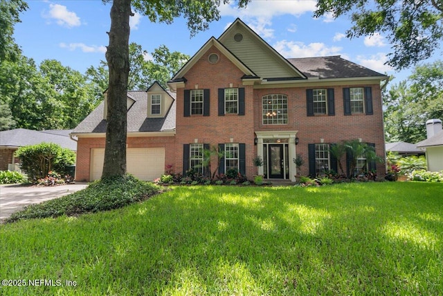11921 Loretto Square Dr S, Jacksonville, FL 32223 - view of front of property featuring brick siding, a garage, and a front lawn