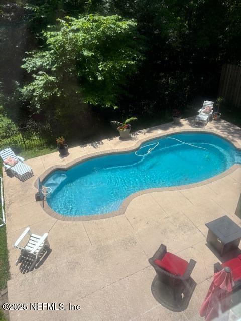 11921 Loretto Square Dr S, Jacksonville, FL 32223 - view of pool featuring a patio area and fence