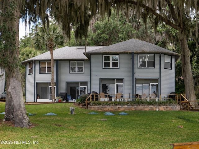 21126 NE 101st Ave, Melrose, FL 32666 - rear view of property featuring a yard