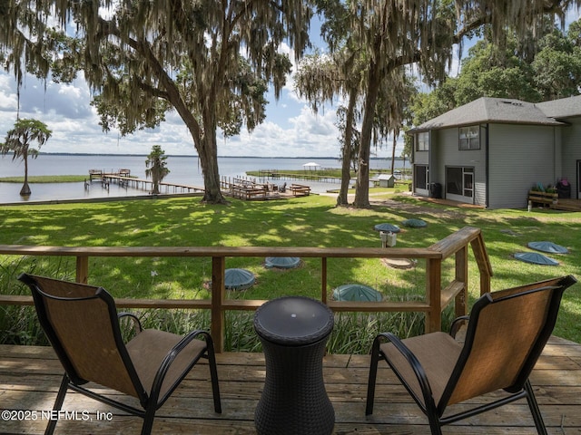 21126 NE 101st Ave, Melrose, FL 32666 - wooden terrace featuring a water view and a yard