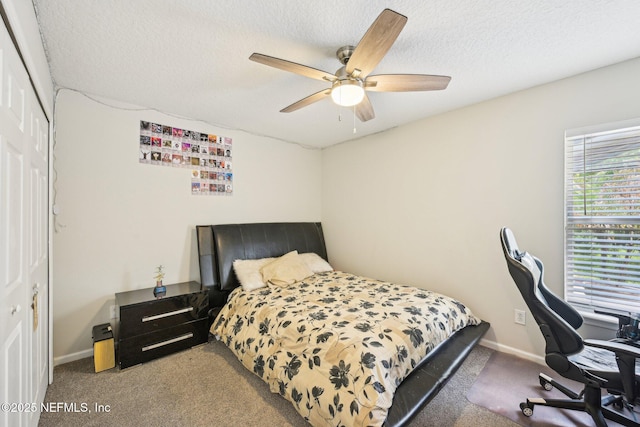 1009 Welaka Way, Saint Augustine, FL 32092 - carpeted bedroom with a closet, a ceiling fan, a textured ceiling, baseboards, and an office area