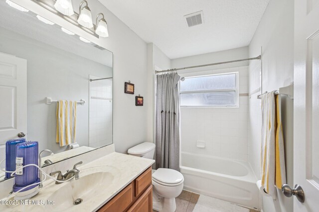 1009 Welaka Way, Saint Augustine, FL 32092 - bathroom featuring toilet, vanity, tile patterned floors, and shower / bathtub combination with curtain