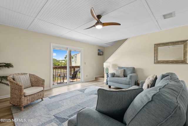 925 Tarpon Ave Unit 16, Fernandina Beach, FL 32034 - living area featuring light wood-style flooring, ceiling fan, and baseboards