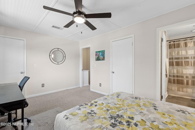 925 Tarpon Ave Unit 16, Fernandina Beach, FL 32034 - carpeted bedroom with baseboards, ensuite bath, ceiling fan, and an office area