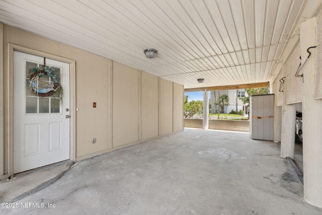 925 Tarpon Ave Unit 16, Fernandina Beach, FL 32034 - view of patio with an attached carport