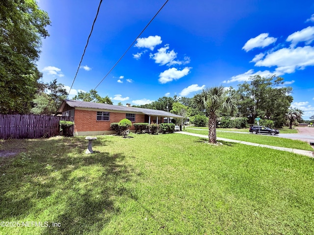 4507 Harbor View Dr, Jacksonville, FL 32208 - view of yard featuring driveway