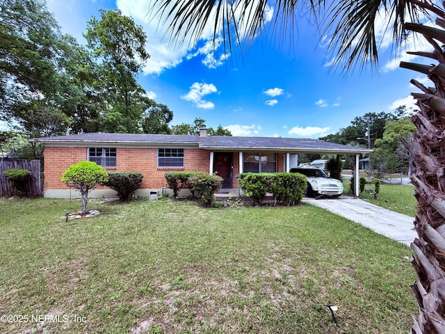 4507 Harbor View Dr, Jacksonville, FL 32208 - ranch-style house featuring a carport, brick siding, driveway, and a chimney