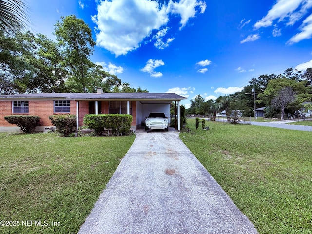 4507 Harbor View Dr, Jacksonville, FL 32208 - ranch-style home with a front lawn, driveway, a carport, brick siding, and a chimney