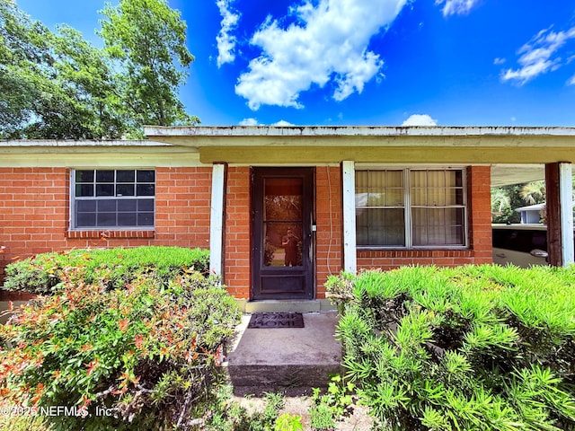 4507 Harbor View Dr, Jacksonville, FL 32208 - property entrance with brick siding