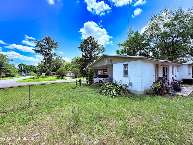 4507 Harbor View Dr, Jacksonville, FL 32208 - view of side of property featuring an attached carport and central air condition unit