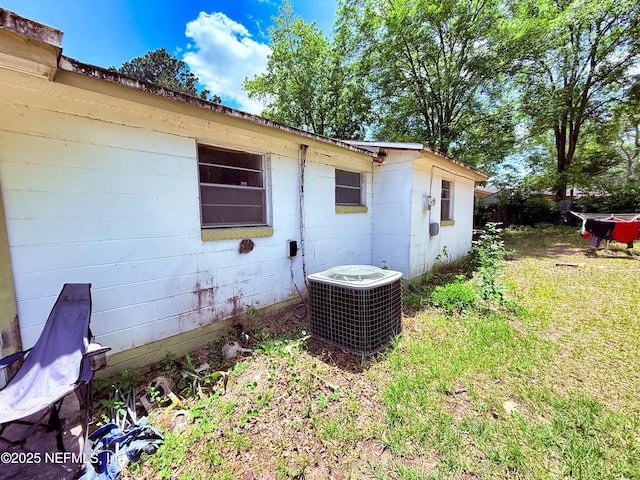 4507 Harbor View Dr, Jacksonville, FL 32208 - view of home's exterior featuring central AC and concrete block siding