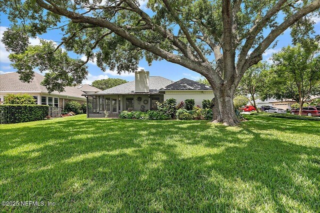 73 Waterbridge Pl, Ponte Vedra Beach, FL 32082 - view of yard with a sunroom
