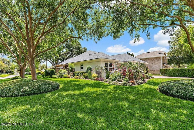 73 Waterbridge Pl, Ponte Vedra Beach, FL 32082 - view of property exterior with a lawn