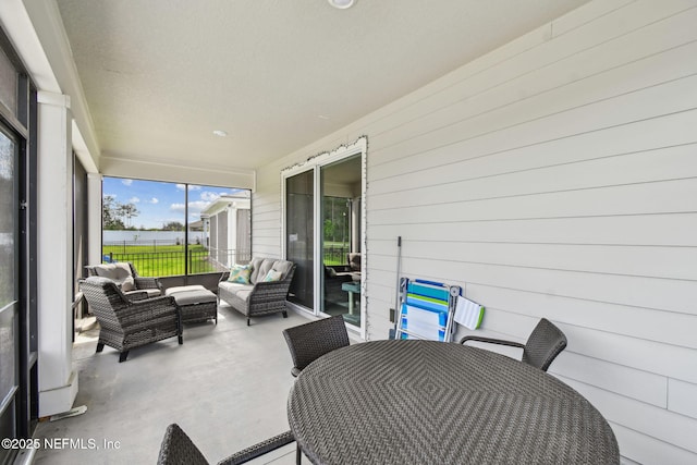 sunroom / solarium with an outdoor living space