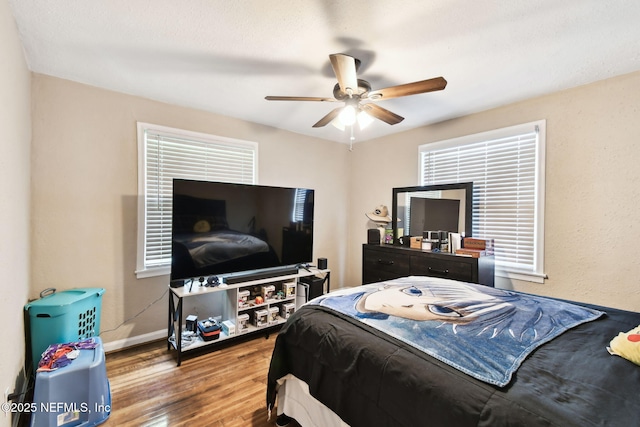 2660 Gale Ct, Jacksonville, FL 32204 - bedroom with wood finished floors, baseboards, and ceiling fan