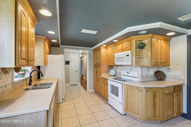4033 Lazy Hollow Ln N, Jacksonville, FL 32257 - kitchen featuring white appliances, a sink, light tile patterned floors, backsplash, and recessed lighting