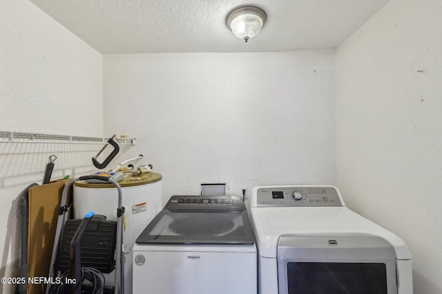 4033 Lazy Hollow Ln N, Jacksonville, FL 32257 - laundry room with independent washer and dryer, water heater, and a textured ceiling