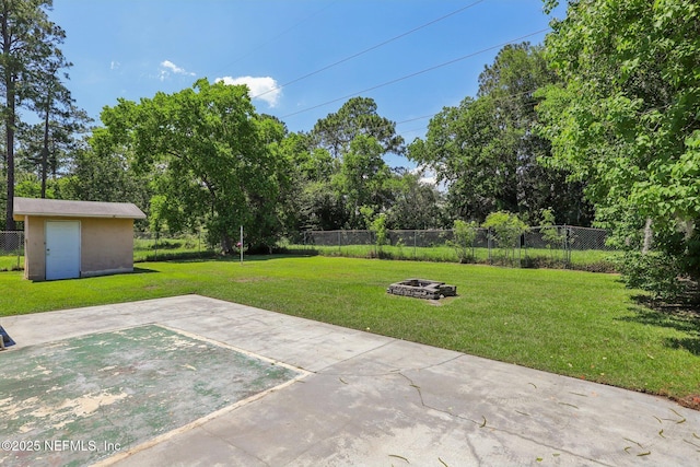 4033 Lazy Hollow Ln N, Jacksonville, FL 32257 - view of yard featuring a fire pit, a patio, and view of scattered trees