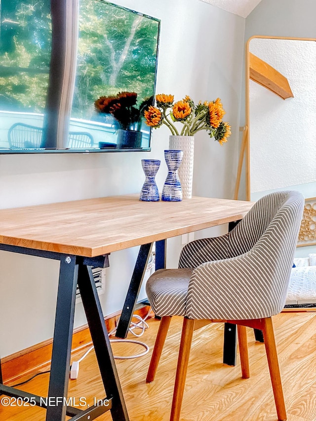 dining area featuring wood finished floors