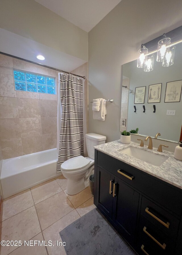 full bath with toilet, tile patterned floors, vanity, shower / bath combo, and a chandelier