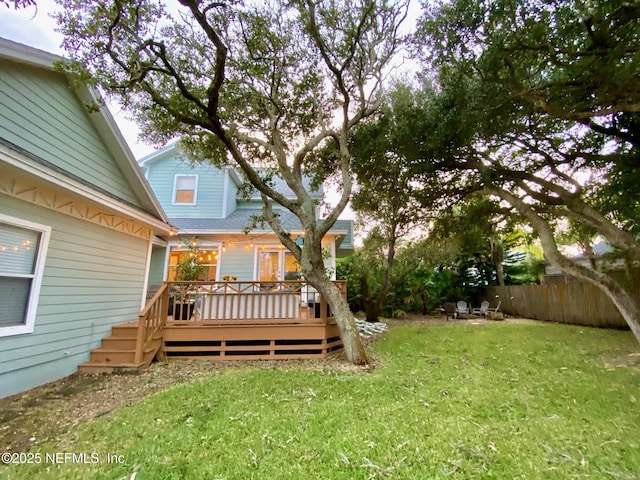 view of yard with a wooden deck