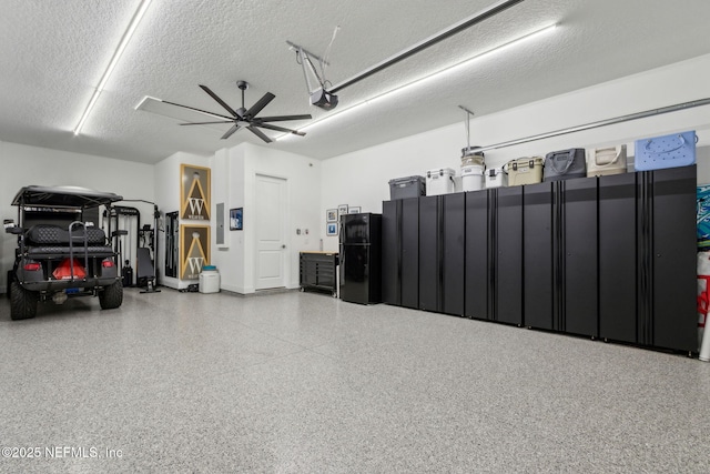 355 Caiden Dr, Ponte Vedra, FL 32081 - garage featuring freestanding refrigerator and a garage door opener