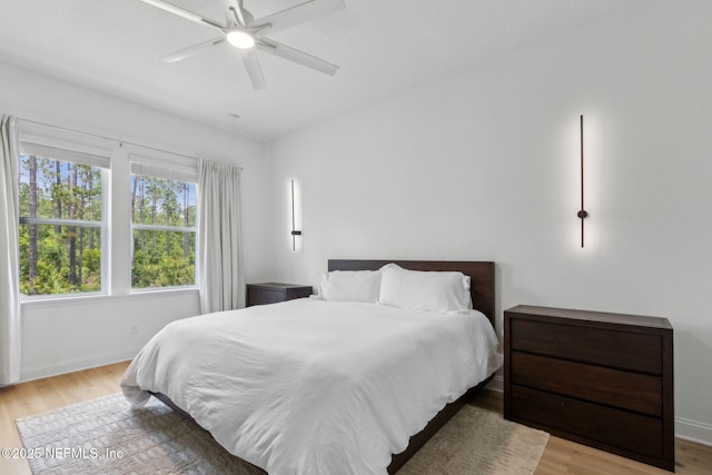 355 Caiden Dr, Ponte Vedra, FL 32081 - bedroom with wood finished floors, baseboards, and ceiling fan