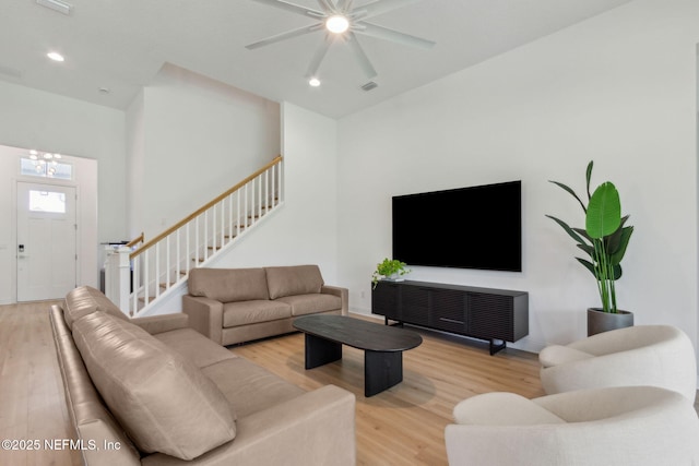 355 Caiden Dr, Ponte Vedra, FL 32081 - living area featuring wood finished floors, stairs, ceiling fan, and recessed lighting