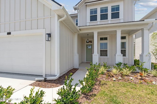355 Caiden Dr, Ponte Vedra, FL 32081 - view of front of property featuring board and batten siding, covered porch, and an attached garage