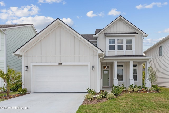 355 Caiden Dr, Ponte Vedra, FL 32081 - view of front facade with board and batten siding, an attached garage, driveway, a shingled roof, and a front lawn