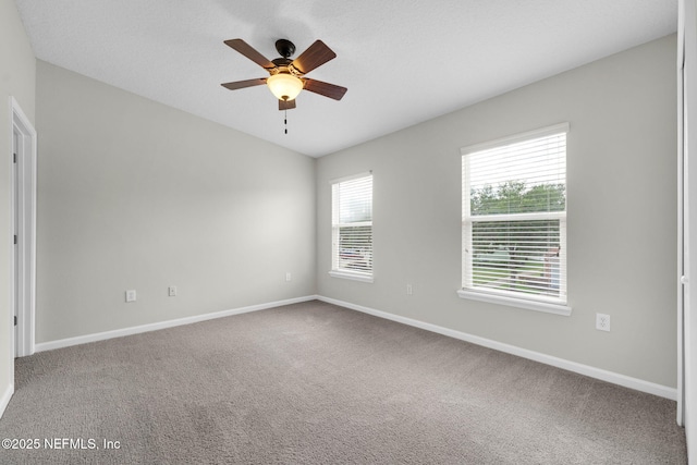 13856 Herons Landing Way Unit 11-7, Jacksonville, FL 32224 - unfurnished room with a ceiling fan, baseboards, and carpet
