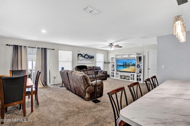 2465 Oak Stream Dr, Green Cove Springs, FL 32043 - living area featuring carpet and ceiling fan