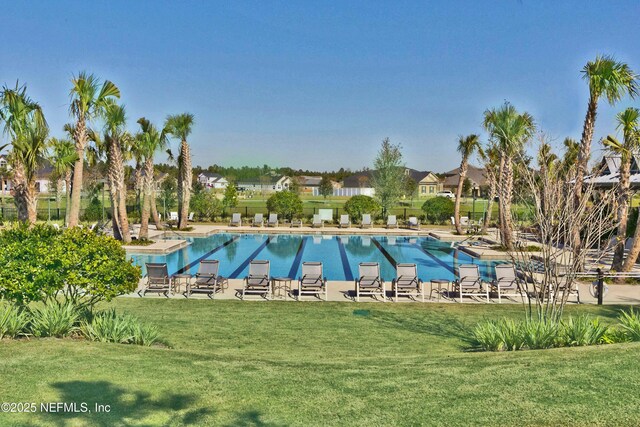 285 Yearling Blvd, Saint Johns, FL 32259 - community pool featuring a yard and a patio area