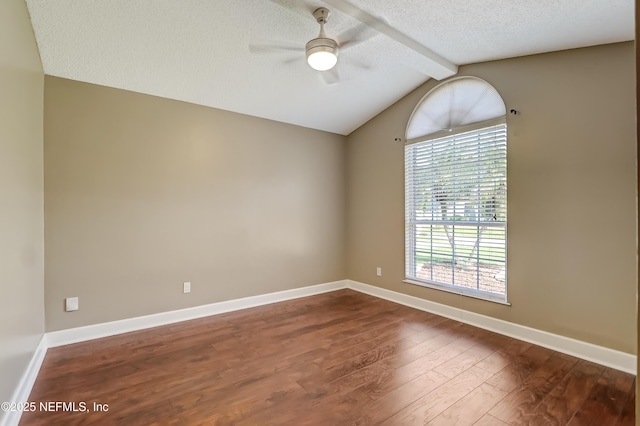 empty room featuring ceiling fan, dark wood-type flooring, a textured ceiling, and baseboards