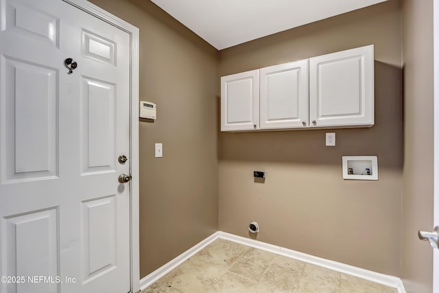 washroom with baseboards, washer hookup, cabinet space, and electric dryer hookup