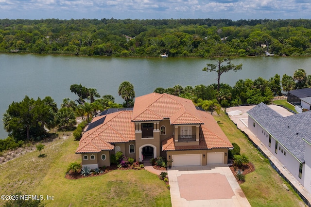 110 Heron Dr, Palm Coast, FL 32137 - view from above of property featuring a large body of water and a forest