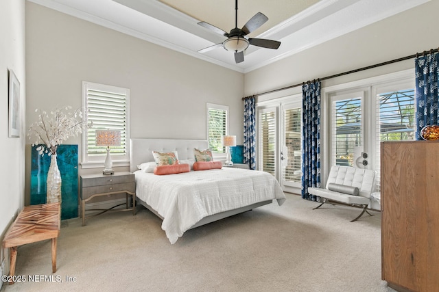110 Heron Dr, Palm Coast, FL 32137 - bedroom with carpet, access to exterior, ornamental molding, multiple windows, and a ceiling fan