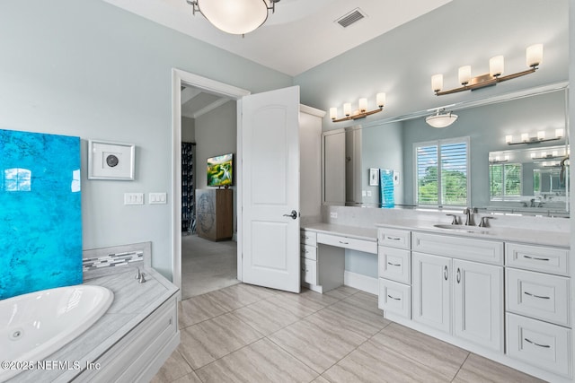 110 Heron Dr, Palm Coast, FL 32137 - full bathroom with tile patterned flooring, a garden tub, and vanity