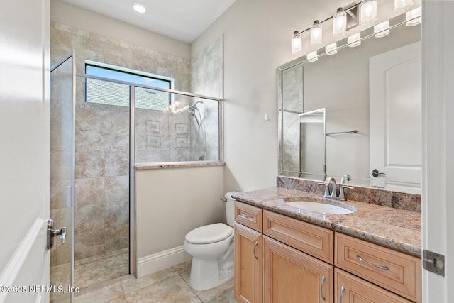 110 Heron Dr, Palm Coast, FL 32137 - full bath with a shower stall, toilet, vanity, and tile patterned flooring