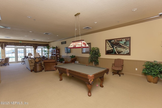110 Heron Dr, Palm Coast, FL 32137 - recreation room featuring carpet, pool table, ornamental molding, wainscoting, and a textured ceiling