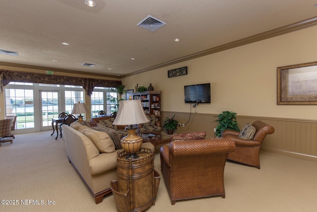 110 Heron Dr, Palm Coast, FL 32137 - living area with carpet, crown molding, wainscoting, and recessed lighting