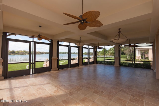 110 Heron Dr, Palm Coast, FL 32137 - unfurnished sunroom featuring a water view and plenty of natural light