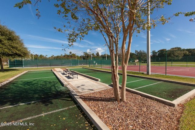 110 Heron Dr, Palm Coast, FL 32137 - view of community with a bocce ball area and fence
