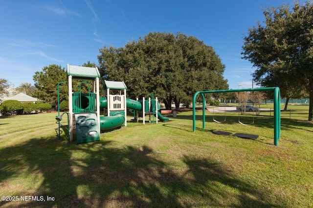 110 Heron Dr, Palm Coast, FL 32137 - community play area with a lawn